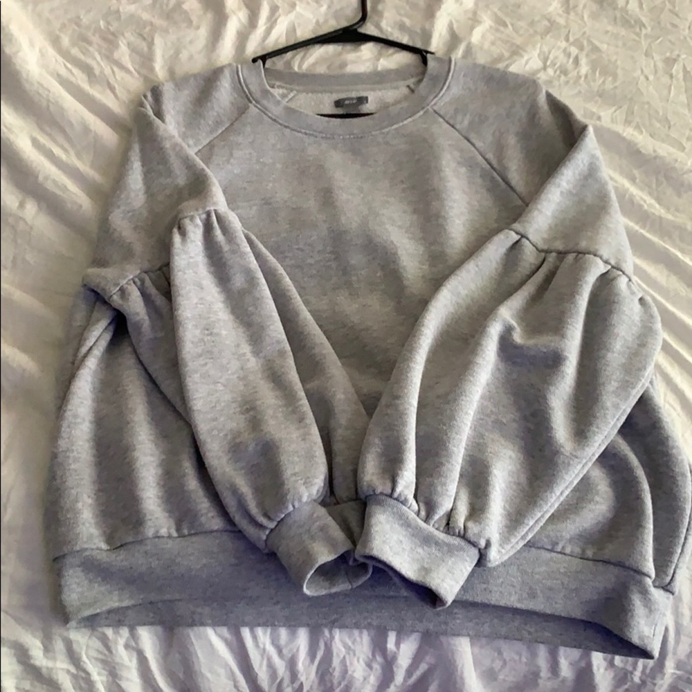 crew neck pull over with ruffled sleeves